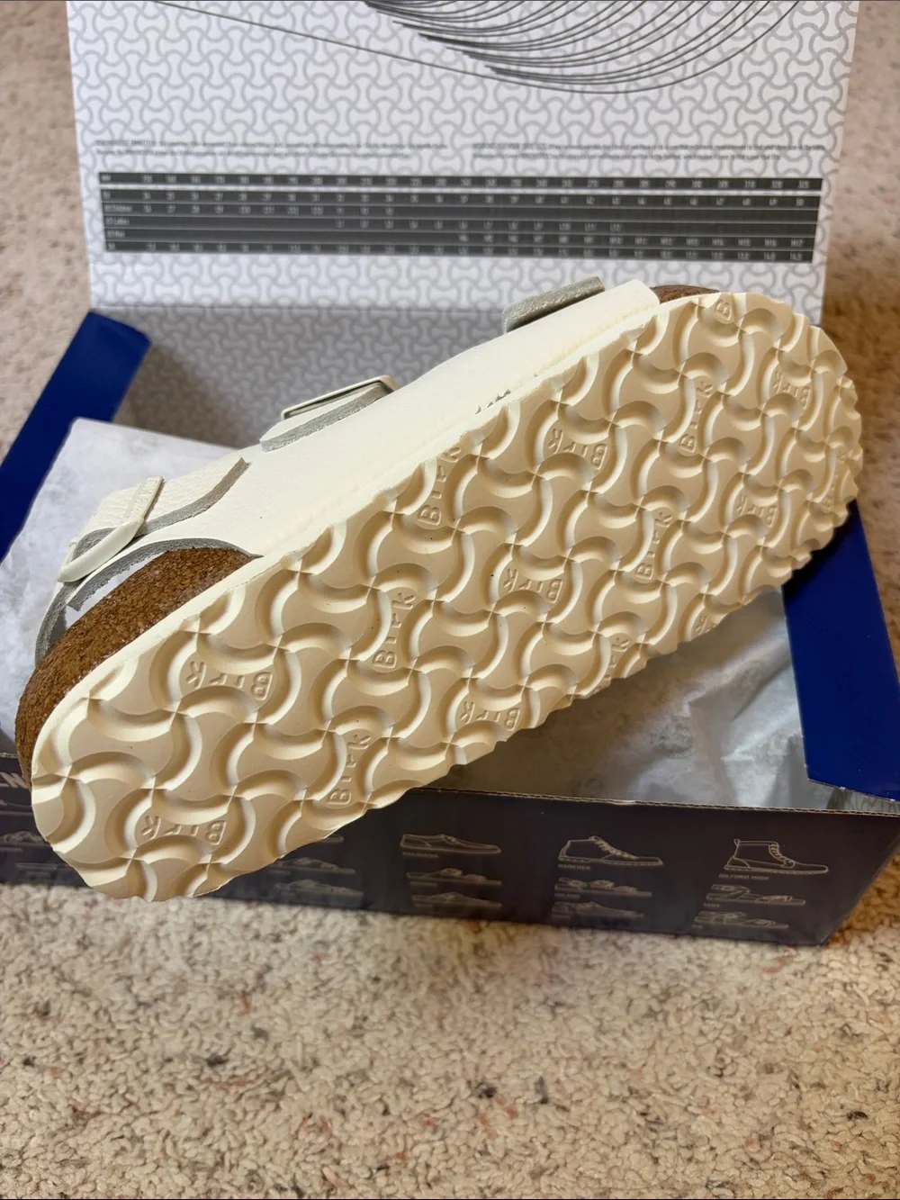 Narrow Birkenstock Cream White Two-Strap Sandal with Buckles